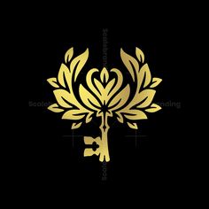 a golden key on a black background with the word love spelled in gold and surrounded by leaves