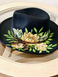 Hand Painted Wide Brim Hat, Black Handmade Spring Hat Bands, Hand Painted Curved Brim Sun Hat For Spring, Handmade Fedora Hat For Spring, Handmade Adjustable Fedora For Spring, Artistic Fedora Hat For Spring, Handmade Spring Fedora Hat, Hand Painted Sun Hat With Curved Brim For Spring, Handmade Flat Brim Hat For Spring, Artisan Fedora For Spring Country Events