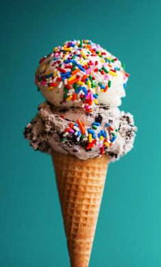 two scoops of ice cream with sprinkles on top