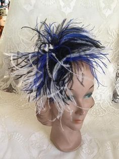 Marabou Feather hair Fascinator. Made from Vintage 1970's Marabou feather boas. Great estate sale find. In colors of Black, Light Blue and White. Attaches to your hair with an attached metal clip (SEE PIX). **SCROLL DOWN FOR MORE INFORMATION** CONDITION: No issues noted. No shedding. ONE SIZE FITS ALL (You can always trim the feathers if you would like less fluff or less length) *I DO COMBINE SHIPPING* **WE APOLOGIZE~BUT WE CAN NO LONGER SHIP TO GERMANY, ITALY OR SPAIN. WE HAVE INCURRED TOO MANY Blue Costume Hat For Carnival, Adjustable Blue Costume Accessories For Costume Party, Adjustable Blue Costume Accessories For Cosplay, Blue Headpieces For Carnival, Blue Costume Hats And Headpieces For Carnival, Blue Carnival Costume Accessories, Blue Feathered Headband Fascinator, Blue Adjustable Costume Hat For Cosplay, Blue Vintage Fascinator For Party