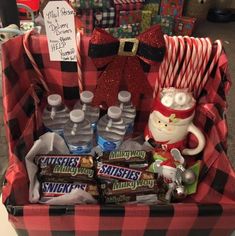 a christmas basket filled with candy and candies