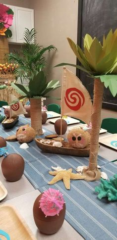 a table topped with lots of different types of food and decorations on top of it