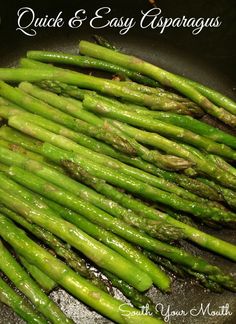 green asparagus cooking in a skillet