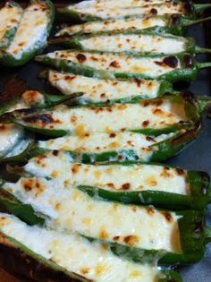 some green peppers with cheese on them