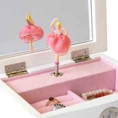 Mele and Co. - Mele & Co. "Katie" Girl's Ballerina Musical Jewelry Box. This charming Mele & Co. "Katie" girl's ballerina musical jewelry box is a modern take on a childhood classic. An open mirrored lift lid allows your little one to accessorize and coordinate as they get ready for their day. Once open, a whimsical ballerina figurine twirls gracefully to the tune of "Magic Flute." Below, a single drawer provides extra storage for all their precious pieces. Features a pretty white exterior with Ballerina Musical Jewelry Box, Katie White, Ballet Music, Ballerina Figurines, Ballerina Jewelry Box, Magic Flute, Ballerina Jewelry, Ballet Studio, Ballet Bag