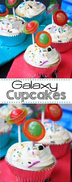 cupcakes with white frosting and colorful candies on top