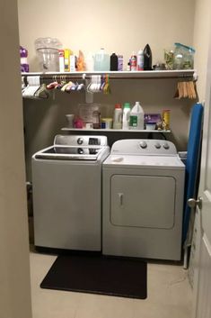 a washer and dryer in a small room