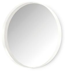 a white round mirror on the wall