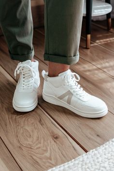 You'll stay ahead of the trends with Gio Sneaker! Featuring a high top build and contrasting stitch details, these sneakers are sure to add a touch of fun and style to any outfit. Put a little zip in your step with these vegan leather cuties! A high top, lace-up sneaker for women. High Top Sneakers Outfit, Winter Sneakers, Store Hours, Sneakers Outfit, White Sneaker, High Tops, High Top Sneakers, Vegan Leather, Winter Outfits