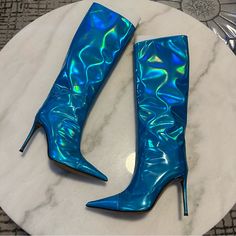 Authentic Elegant Blue Boots For Formal Occasions, Elegant Blue Formal Boots, Chic Blue High Ankle Heeled Boots, Blue High Ankle Heels For Party, Blue Leather Heeled Boots With Snip Toe, Blue Pointed Toe Heeled Boots For Party, Blue High Heel Boots With Reinforced Heel, Blue High Heeled Boots With Reinforced Heel, Elegant Blue Boots With Leather Sole