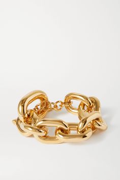 Since taking the helm at Paco Rabanne, Creative Director Julien Dossena has reworked its house codes in new and unexpected ways - the label's founder was well known for his use of chains and this gold-tone bracelet nods to that. The links are blown up to XL proportions and it fastens with a T-bar embossed with the brand's moniker. Latest Bracelets, Resin Bracelet, Bracelets Design, Twisted Bracelet, Gold Bracelet Cuff, Silver Chain Bracelet, Gold Bracelet Chain, Paco Rabanne, Silver Cuff Bracelet