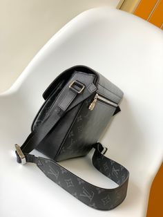 New Messenger bag is newly unveiled in the Taigarama series. It is made of soft Taiga leather and canvas to create ample space. Open the spring buckle to reveal the spacious front pocket and double inner pockets, making it a smart companion for urban life. Size: 29.0 x 23.0 x 11.5 cm (LxHxW) Coated canvas and calfskin Coated canvas and calfskin trim Textile lining metallic parts Front pocket under buckle Dual inner pockets Back zip pocket Shoulder strap: non-detachable, adjustable Strap half len Modern Crossbody Flap Bag For Travel, Modern Flap Bag With Removable Pouch For Business, Modern Satchel Flap Bag For Travel, Modern Flap Satchel Bag For Travel, Modern Satchel Camera Bag, Luxury Everyday Shoulder Camera Bag, Designer Everyday Satchel With Detachable Strap, Designer Satchel With Detachable Strap For Everyday, Modern Travel Flap Shoulder Bag