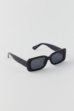 UO essential rectangle sunglasses. A simple classic, these rectangle sunglasses are a must-have. Chunky plastic frames with a rectangle lens complete with UV protection. Features UO essential rectangle sunglasses Simple classic rectangle sunglasses Made in part with recycled materials UV 400 protection Content + Care 60% Recycled post-consumer polycarbonate, 36% polycarbonate, 4% copper Wipe clean Imported Size Temple: 140mm Lens: 50.5mm Bridge: 21.5mm | Urban Outfitters UO Essential Rectangle S Chunky Black Sunglasses, Rectangle Sunglasses, Black Sunglasses, Uv Protection, Cleaning Wipes, Urban Outfitters, Sunglasses, Black