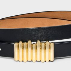 Add a statement finish to your looks with this Long Square Peg Buckle Belt from A New Day™. This stylish belt with a slim profile features a long gold metal peg buckle detailed with texture for a cool look. The adjustable strap offers a secure, customized fit around your waist, and the black color pairs with a variety of casual or dressier outfits. A New Day™: Style that goes wherever you do. Gold Belts With Gold-tone Hardware For Office, Modern Belts With Gold-tone Hardware For Work, Modern Belts With Gold Buckle, Modern Gold-tone Hardware Belt For Workwear, Modern Gold-tone Hardware Belts For Work, Trendy Formal Belt With Gold Buckle, Modern Belts With Gold Buckle For Office, Modern Gold Belt Buckles, Trendy Belt With Gold Buckle For Work