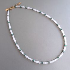 This Men beaded necklace, Small bead necklace is a gentle necklace for men. A unique summer beaded necklace, beach necklace men. Wear this beautiful men turquoise necklace with a white shirt. Measurements: 20 inches (50 cm) Materials: White Agate.  Turquoise Jade gemstone.  Golden Hematite. Goldfield closer. All the jewelry in my shop is designed with love and handmade by me. They are packed carefully in a gift box. See more necklaces in my shop   https://www.etsy.com/il-en/shop/TsilaAxelrod?ref Men Beaded Necklace, Beaded Necklace Men, Small Bead Necklace, Summer Beaded Necklace, Beach Necklace, Beach Necklaces, Jade Gemstone, Necklace Men, Men Wear