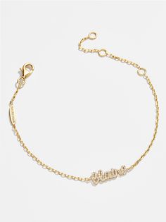 For those who like to add a little bit of sparkle to their personalized pieces, we designed the 18K Gold Pavé Custom Nameplate Bracelet. Type out any personalization you please and your customization will appear in a pretty script font. The nameplate will be placed on a super dainty paperclip chain. Please note, we are unable to produce products with profanity. Note: your customization will appear in all lowercase letters. Cutest Jewelry, Gold Name Bracelet, Birthday Outfit For Teens, Pretty Script Fonts, Nameplate Bracelet, Map Gifts, Name Bracelet, Custom Map, Script Font