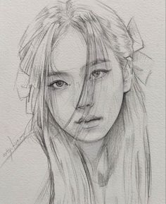 a pencil drawing of a girl with long hair