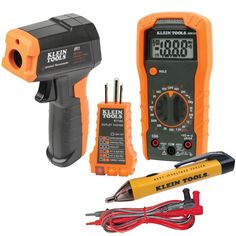 an orange and black digital multimeter with tools