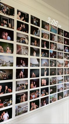 the wall is covered with many pictures of people and their names in white letters on it