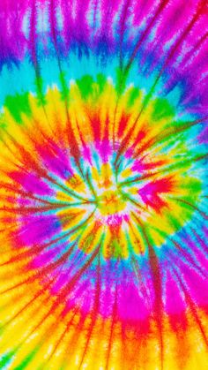 a colorful tie - dyed background with many colors