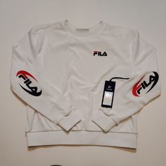 Fila Emilia Sweatshirt Crewneck Velour White New With Tags!!! Size - Women's Small White Logo Print Sweater For Spring, White Sweater With Logo Print For Spring, White Crew Neck Top For Winter, White Crew Top For Streetwear, White Crew Top With Ribbed Cuffs, White Relaxed Fit Crew Top, White Crew Neck Top With Ribbed Cuffs, White Crew Neck Top For Spring, Fila Jacket