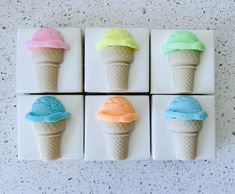 four ice cream cones with different colors on them are arranged in squares to look like they're melting