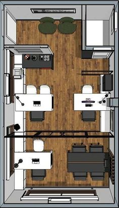 an overhead view of a kitchen and living room in a tiny apartment with wood flooring