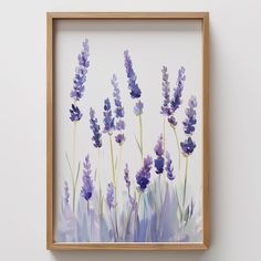 a painting of lavender flowers in a wooden frame