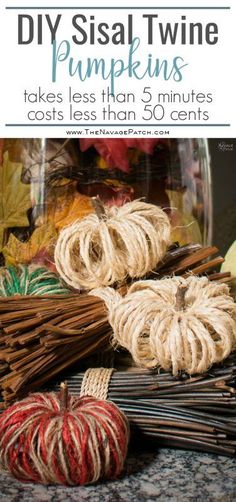 twine wrapped pumpkins sitting on top of a table next to some other items