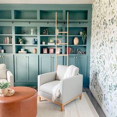 a living room filled with furniture and shelves