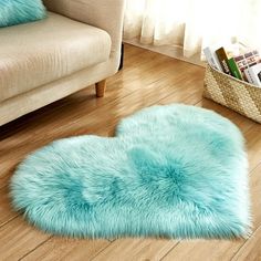 a heart shaped rug on the floor in a living room