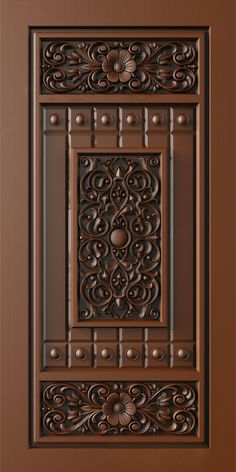 a brown door with intricate carvings on it