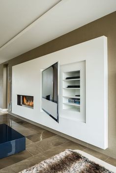 modern living room with fireplace and large windows