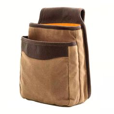 "Love these bags. Well made and great material. Love Mission Mercantile hunting gear!" - Marcos P., White Wing Waxed Canvas Hunting Double Belt Pouch customer Our weather-resistant double Belt Pouch provides a wide range of diverse use. From a box of shells on the range, foraging in the woods, or perhaps nails and screws on your next project, our durable Belt Pouch keeps its contents close at hand for quick, easy access. The divided compartment, lined with military grade nylon for easy cleaning, Outdoor Brown Pouch With Pockets, Brown Outdoor Pouch With Pockets, Brown Utility Bag For Outdoor Activities, Brown Outdoor Bags With Pockets, Brown Pouch Bag For Outdoor Activities, Practical Brown Bags With Pockets, Practical Brown Bag With Pockets, Brown Canvas Bag With Silt Pocket, Practical Brown Pouch Bag