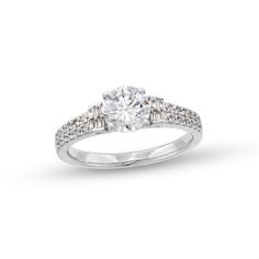 Make a beautiful promise of love with this stunning multi-diamond engagement ring. 14K white gold The engagement ring showcases a 1 ct. round diamond center stone Quartets of baguette-cut diamonds flank each side of the center stone Smaller round diamonds line the ring's double shank 1-1/5 ct. t.w. of diamonds Baguette Cut Diamond, Baguette Cut, Round Diamond, Diamond Engagement, Diamond Engagement Rings, Round Diamonds, Of Love, Diamond Cuts, Engagement Ring