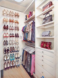 the closet is full of shoes and purses