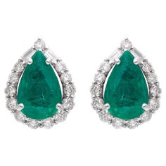 Luxury Baguette Cut Diamond Earrings For Formal Occasions, Luxury Formal Baguette Cut Diamond Earrings, Luxury Hallmarked Pear-shaped Diamond Earrings, Luxury Pear-shaped Gemstone Diamond Earrings, Luxury Pear-shaped Diamond Earrings With Gemstones, Classic Formal Earrings With Baguette Diamonds, Luxury Pear-shaped Emerald Earrings, Luxury Diamond Gemstone Earrings For Formal Occasions, Luxury Diamond Earrings With Gemstones For Formal Occasions