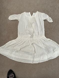 Vintage child's white cotton dress. 29" long. 2 small tears in the front top & side neck area. Size probably 2 - 4 years?? Cotton Baptism Dress With Short Sleeves, Cotton Short Sleeve Baptism Dress, Cotton Baptism Dress With Short Sleeves For Daywear, Summer Cotton White Baptism Dress, White Cotton Baptism Dress For Summer, Summer White Cotton Baptism Dress, White Short Sleeve Baptism Dress For Daywear, White Baptism Dress With Short Sleeves For Daywear, Summer Cotton Baptism Dress