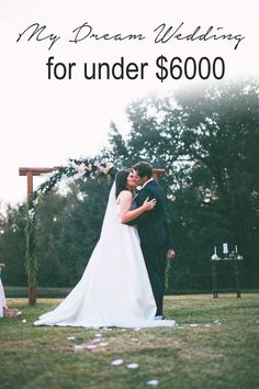 a bride and groom kissing under an arch with the words, my dream wedding for under $ 6000