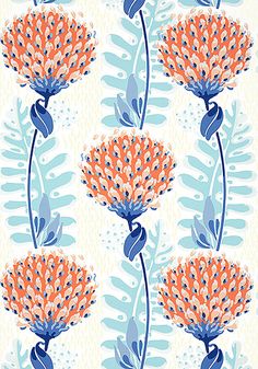 an orange and blue flower pattern on a white background with green leaves in the foreground