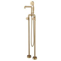 a gold colored shower faucet with two handset and hand held shower head