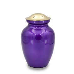 With its classic traditional shape, glimmering finish, and budget-minded price, the Deep Purple Cremation Urn is the perfect choice for creating a spectacular memorial without breaking the bank. The reflective finish of deep purple evokes wisdom and spirituality. The color is often associated with bravery and magic and will help you pay a fitting tribute to a loved one. Materials: Hand-cast alloy and polished brass Threaded Lid for Secure Closure Engraving Not Available The body is crafted of du Deep Purple Color, Keepsake Urns, Pet Urns, Small Budget, Memorial Keepsakes, Cremation Urns, Hand Cast, Pet Loss, Deep Red