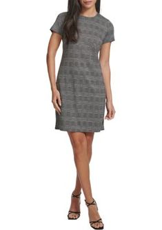 This posh A-line dress from Calvin Klein showcases a timeless houndstooth print. | Calvin Klein Women's Short Sleeve Printed A-Line Dress, 12 Calvin Klein Workwear Dresses For Fall, Calvin Klein Fall Workwear Dresses, Classic Career Dresses For Fall, Houndstooth Mini Dress For Work, Classic Calvin Klein Dresses For Work, Formal Houndstooth Dress For Fall, Houndstooth Pattern Mini Dress For Work, Calvin Klein Formal Dress For Fall, Calvin Klein Fall Formal Dress