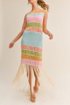 This crochet maxi dress is the perfect way to add a touch of luxury to your wardrobe. The soft, breathable fabric is made from high-quality materials, and the intricate crochet detailing is sure to turn heads. Pair it with statement jewelry and heels for a glamorous look, or with sandals and a denim jacket for a more casual look. Fringe Dress, Dress Crafts, Sheer Material, Vacation Dresses