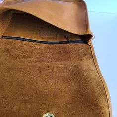 "Vtg Coach Original Convertible Clutch British tan soft and supple leather with brass hardware Roomy interior with one inner zippered pocket, outer slip pocket covered by a flap and secured with a turnlock Detachable 40\" strap Hang tag and chain Measures: 11 5\"L, 7.5\"H, 2\"W Made in New York, USA #086-1243 Amazing condition Cleaned, conditioned and ready to wear! Questions? Just ask More vintage coach styles/colors are also available G65" Classic Double Flap Travel Bag, Classic Soft Leather Satchel For On-the-go, Leather Flap Bag For On-the-go, Dark Tan Leather-lined Satchel Shoulder Bag, Daily Use Satchel With Double Flap, Daily Use Double Flap Satchel, Classic Soft Leather Saddle Bag For On-the-go, Classic Dark Tan Leather Shoulder Bag, Dark Tan Leather Satchel