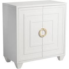 a white cabinet with two doors and a gold ring on the door handle, against a white background