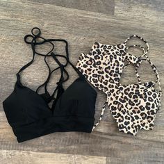 Pair Of New And Unused Shein Bikini Tops. Adjustable Tie Straps, Lightly Padded. One Plain Black, The Other Leopard Print. Black Tankini With Built-in Bra For Vacation, Black T-back Halter Top For Poolside, Black Triangle Top Tankini For Beachwear, Black Strappy Tankini For Swimming, Black T-back Halter Top For Sunbathing, Black T-back Tankini For Beach, Black Beachwear Halter Top For Pool, Black Stretch Halter Top For Beach, Black Halter Top For Beach Season