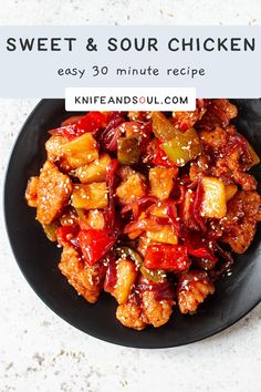 sweet and sour chicken on a black plate with text overlay that reads, sweet and sour chicken easy 30 minute recipe