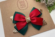 "I love this bow !! Such a cute green, gold, and red Christmas hair bow. The perfect Christmas hair bow to celebrate your little princess' Christmas or to visit Santa. My boutique hair bows are Light weight and attached to a no-slip alligator clips, perfect for girls of all ages. Hair Bow Measures Approx. 4\" x 3\". Please reference the size before purchasing to ensure it is the size you would like. Back to Pink hair bow boutiques store : https://www.etsy.com/shop/PinkHairBowBoutique" Christmas Bows For Hair, Christmas Hair Bows Diy, Christmas Hairbow, Gold And Red Christmas, Christmas Hair Clips, Princess Christmas, Holiday Hair Bows, Christmas Hair Accessories, Pink Hair Bows