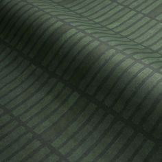 an image of a green and black pattern on a sheet or bed coverlet that has been made to look like something out of fabric